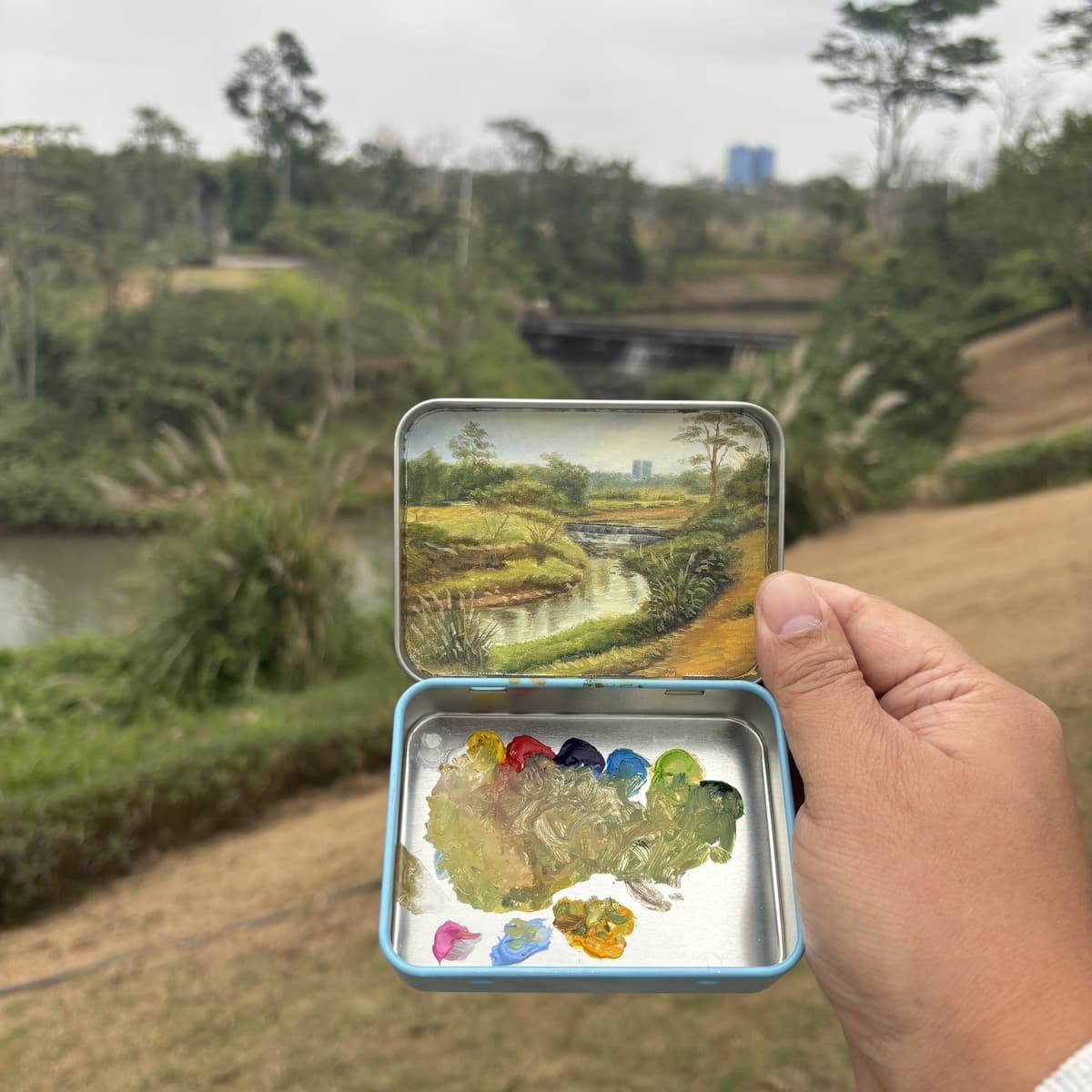 Limited edition pocket painting with mountain reflection
